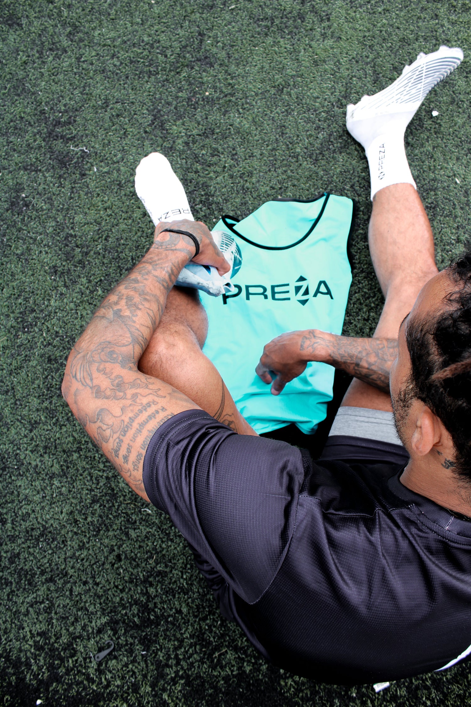 Model with Preza Training Pinnie and Preza Grip Socks